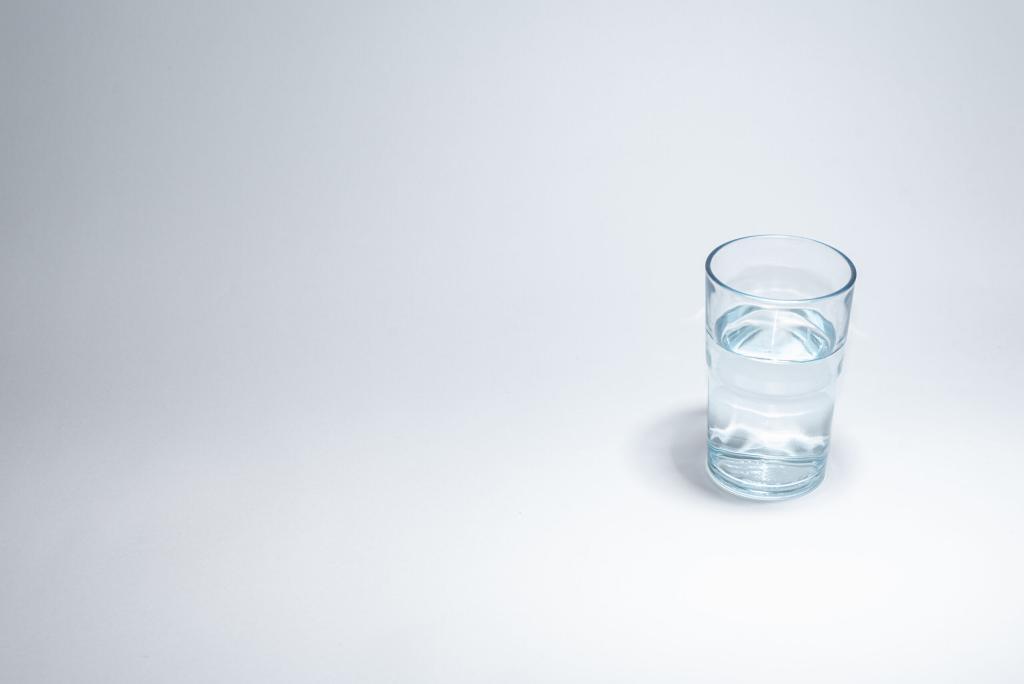 Traditional glass cup over white background