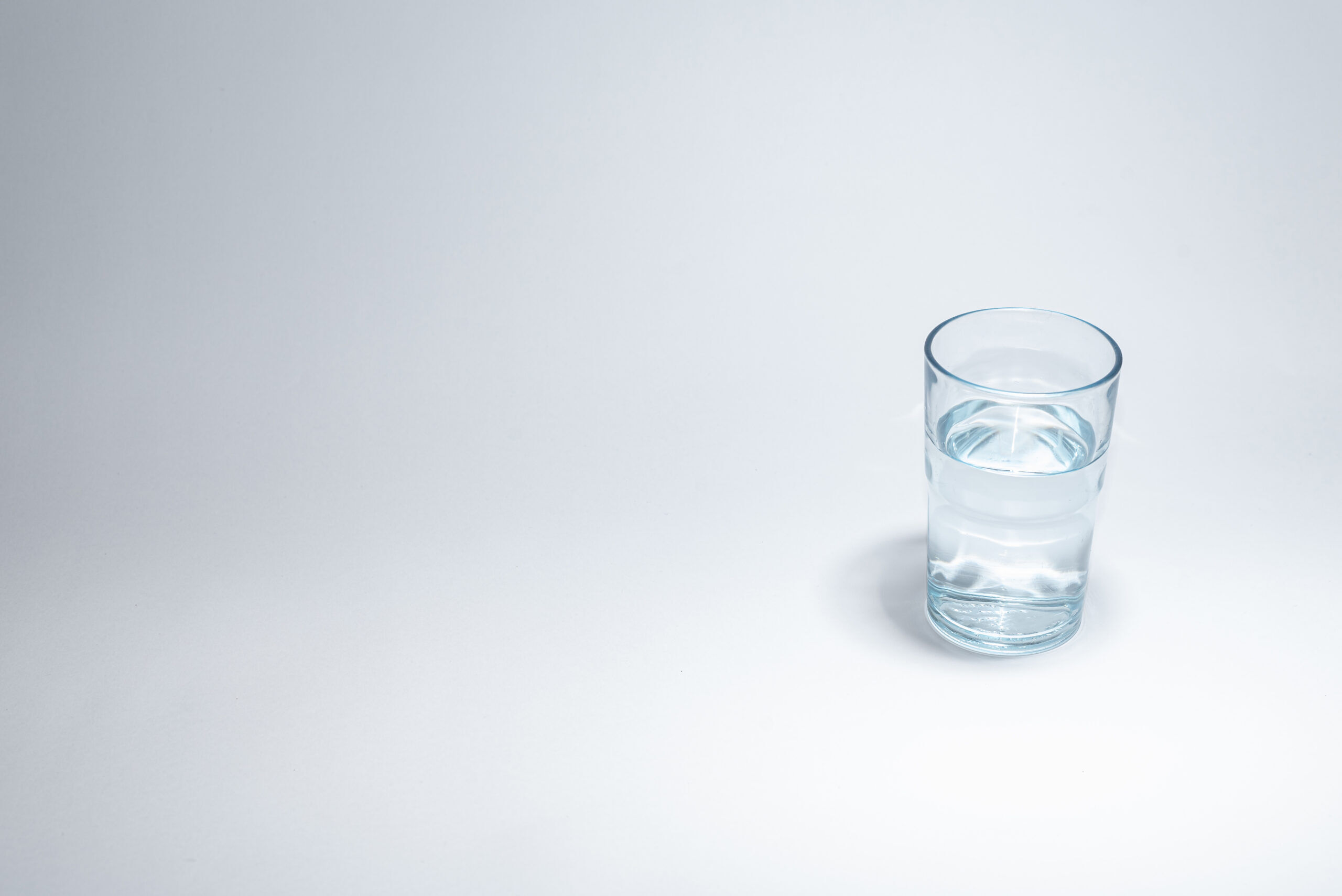 Traditional glass cup over white background